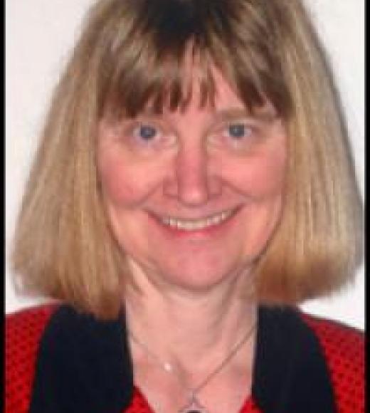 A photo of Professor Lokke looking straight on to the viewer, smiling