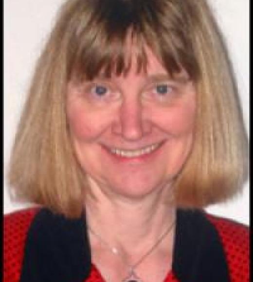 A photo of Professor Lokke looking straight on to the viewer, smiling