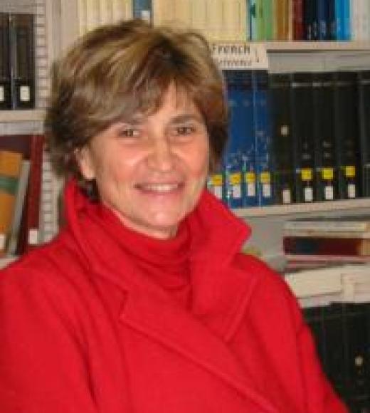 A picture of Professor Schiesari, smiling at the viewer