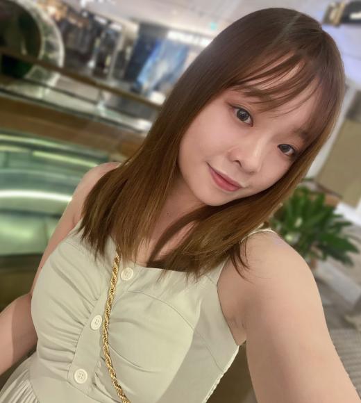 Woman in a yellow shirt.