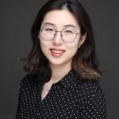 Photo of Tianyun Hua smiling at the viewer