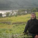 A picture of Professor McLean at the left, in a nature scene. 